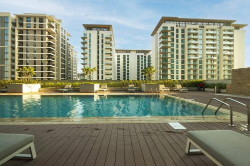 Swimming pool, STAY BY LATINEM Luxury 1BR Holiday Home OPA2410 near Burj Khalifa in Nad Al Sheba