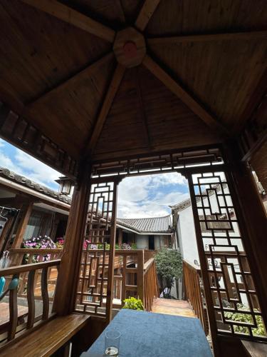 ระเบียง/ชานเรือน, 夕露小榭星期六南门广场店XILUXIAOXIE Saturday in ลี่เจียง