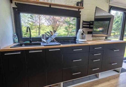 Mini maison Tiny house 6 per 3800m2 jardin Jacuzzi in Pontault-Combault