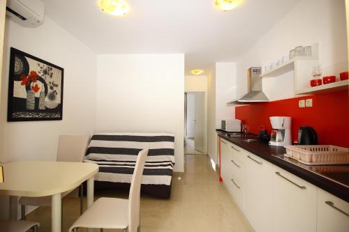 One-Bedroom Apartment with Terrace and Garden View
