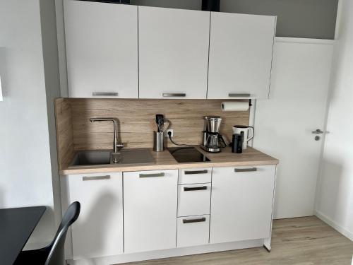 Kjøkken, PANORAMA - Exklusives Apartment an der Promenade mit Dachterrasse & Rheinblick in Emmerich am Rhein