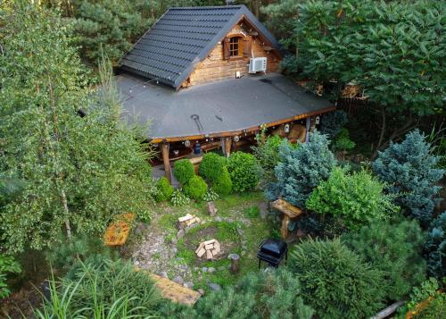 Exterior view of Domek w Ogrodzie Caloroczny 800m od Parku Wodnego Suntago Ranczo Gold Mania