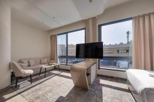 Mirage Hotel & Conference Center Room Type - Premium King Room with Pool View