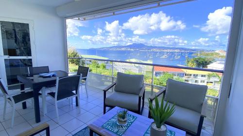 Atlantis, Magnifique T2, vue mer, proche plage, Anse Mitan