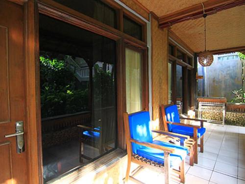 Balcony/terrace, Dewa Bharata Bungalows Candidasa in Candidasa