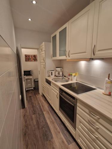 virtuve, Ferienwohnungen Dümmersee - Haus Dümmerland - Wohnung 3 (Ferienwohnungen Dummersee - Haus Dummerland - Wohnung 3) in Hude (Diepholz)