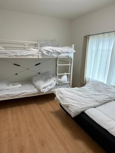 東神楽大学ゲストハウス Room Type - Economy Triple Room with Shared Bathroom