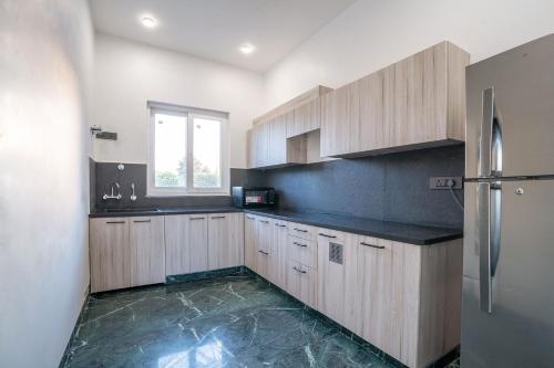 Kitchen, StayVista at Sukoon with Bonfire in Lucknow