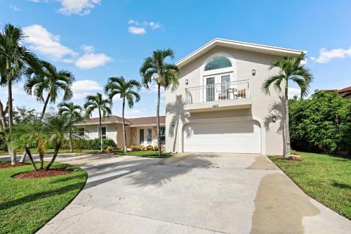 Pet-friendly two-story home with pool, spa, and grill