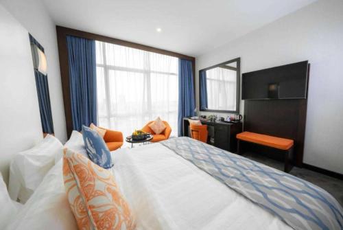 Premium Room room in Ramada Encore by Wyndham Doha