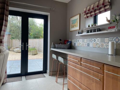 Facilities, The Paddocks - Spacious annexe with rural outlook. in Wool