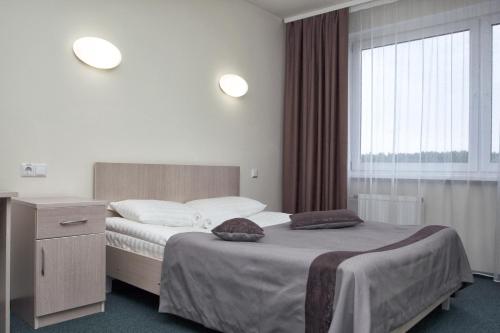 IT Time Hotel IT Time Hotel is perfectly located for both business and leisure guests in Minsk. The property features a wide range of facilities to make your stay a pleasant experience. Service-minded staff will we