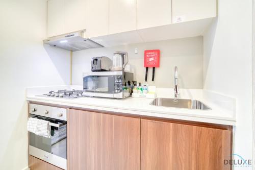 Contemporary 1BR at Vera Tower Business Bay by Deluxe Holiday Homes, Dubai (Foto 4)
