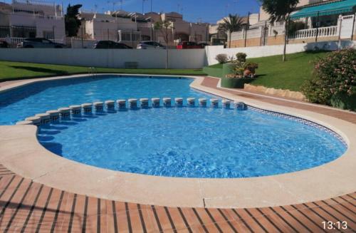 Apartament Casa del Gato Rojo , communal swimming pool , terrace with barbecue