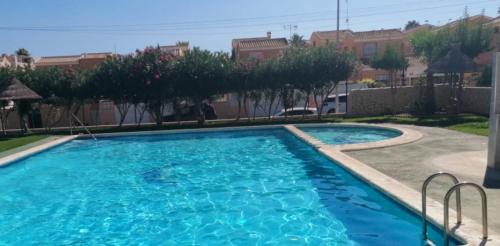 Apartament Casa del Gato Rojo , communal swimming pool , terrace with barbecue