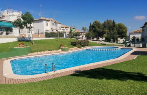 Apartament Casa del Gato Rojo , communal swimming pool , terrace with barbecue