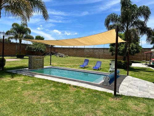 Casa de descanso alberca climatizada in Atlixco, Mexico