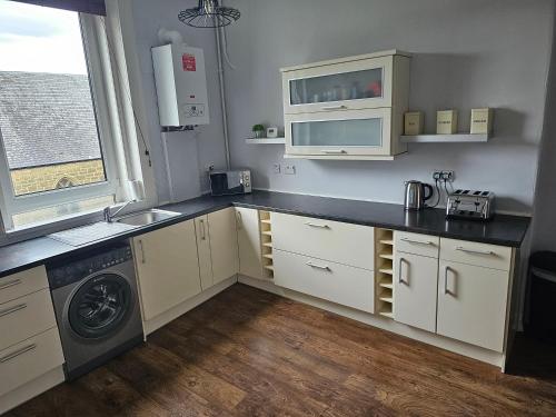 Snug - Abhainn Apartment in เฮเลนส์โบ่