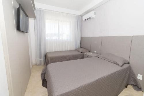 115E - Luxuoso 2 quartos em condomínio fechado em Bombas, Bombas (fotografie 10)