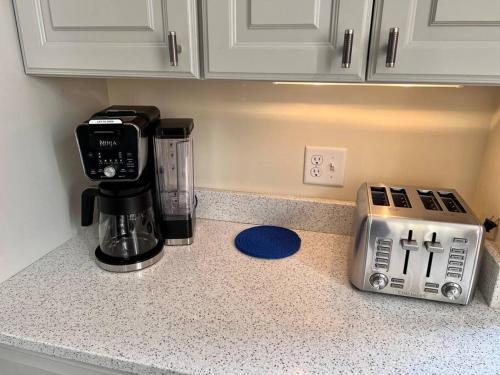 Historic Corner Apartment with patio & off street parking