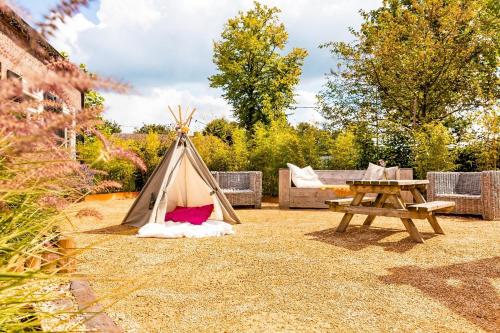 Brabantse Hoeve in ไบเทนเคอบีดโฟลเกล