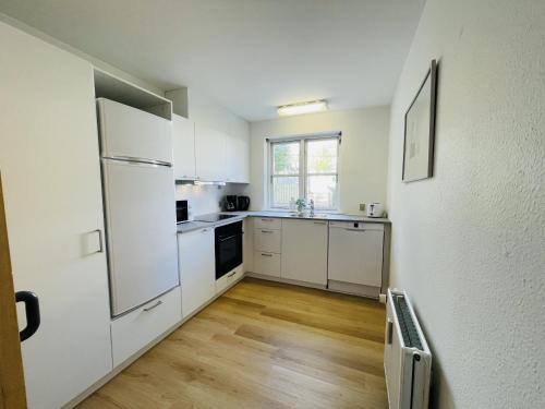 Kitchen, aday - Central Terrace Apartment in Hjorring in Hjorring