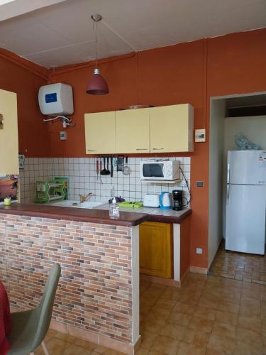 BIENVENUE AU SOLEIL LEVANT assier entrée morne savon ,le lorrain (BIENVENUE AU SOLEIL LEVANT assier entree morne savon ,le lorrain) in Le Marigot