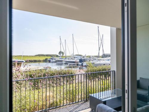 Surrounding environment, Modern apartment on the ground floor with a view over the harbor of Kamperland in Kamperland