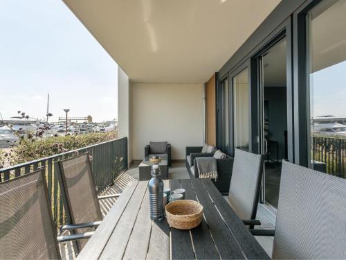 Balcony/terrace, Modern apartment on the ground floor with a view over the harbor of Kamperland in Kamperland