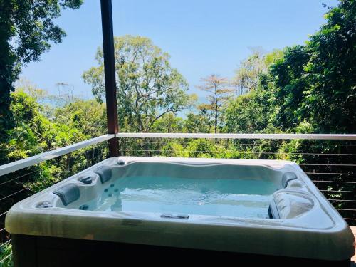 Sky: rainforest and ocean views with jacuzzi