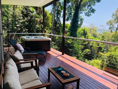 Sky: rainforest and ocean views with jacuzzi