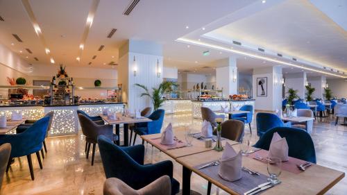 Ristorante, SeaVille Beach Hotel by Elite Hotels & Resorts in Ataqah