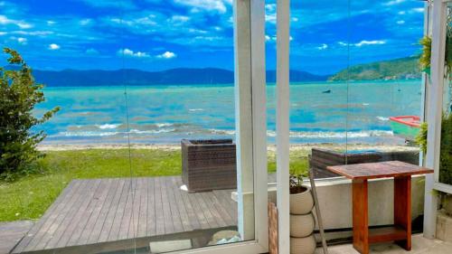 Incrivel casa com WiFi pe na areia em Palhoca SC