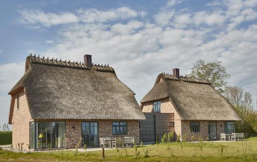 Reetdorf Geltinger Birk Malerhaus Nebeltreiben in Nieby, Deutschland