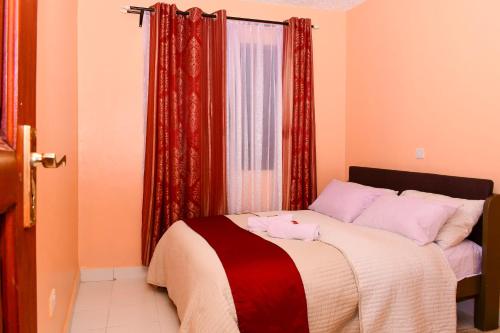 B&B Embu - The Lotus Stay-in at Paradise Apartments, Embu - Bed and Breakfast Embu