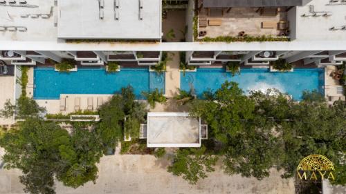 NHOA 309C Lux 1BR Condo Pool View in Aldea Zama - image 2
