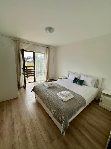 Camera dubla cu balcon si living privat - Accommodation - Sînpetru