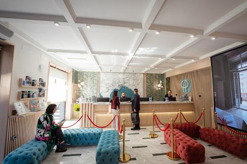 sala de TV, P.C. Boutique H. Castel Nuovo, by ClaPa Group Dislocated Hospitality in Molo Beverello
