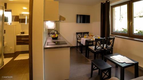 Mucha Apartments - image 13