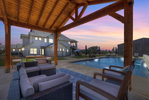 Luxurious Hill Country Retreat with Pool and Firepit! in Dripping Springs, USA