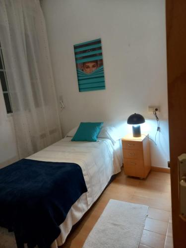 Apartamento con pequeño jardín en el centro