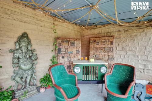 StayVista's Madan Villa - City-Center Villa with Manicured Lawn & Picturesque Sit-Outs