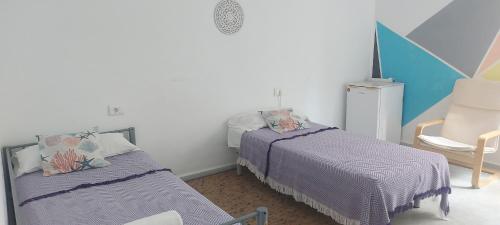 Coordenadas Ibiza Room Type - Standard Twin Room with Shared Bathroom Coordenadas Ibiza Room Type - Standard Twin Room with Shared Bathroom