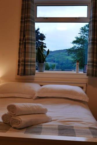 Cosy Hygge/ Scottish themed home by Loch Ness