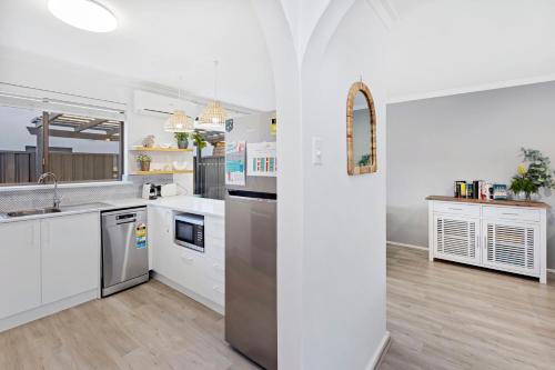 Two-Bedroom Villa room in Coastal convenience! Walk to the shops & cafes...