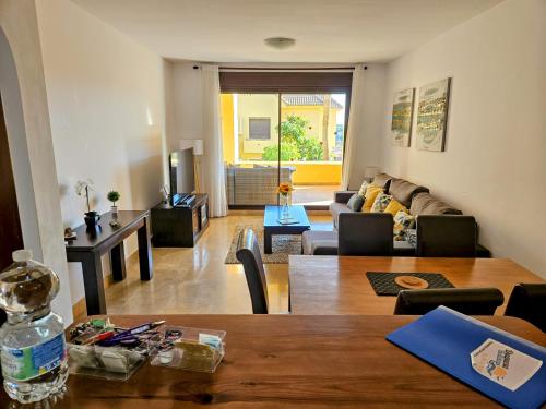 Ground floor 2 bed apartment with 5 pools and large terrace