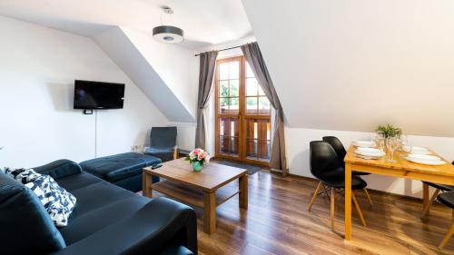Apartamenty Sun & Snow Leśny Dom - image 12