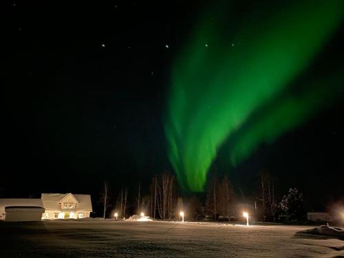 Northern Lights exclusive house by the river - Accommodation - Boden