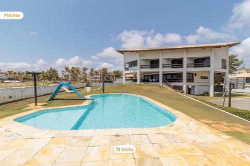 Casa frente mar no Porto das Dunas por Tactu