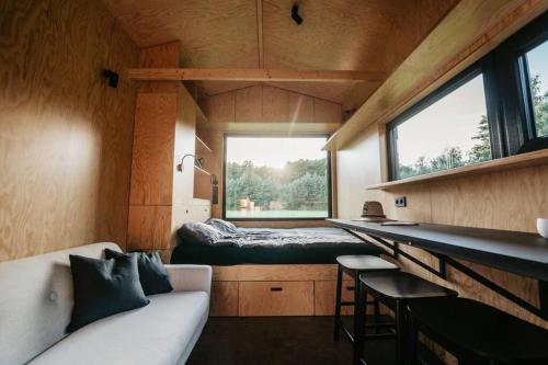 Tiny house in apple orchard